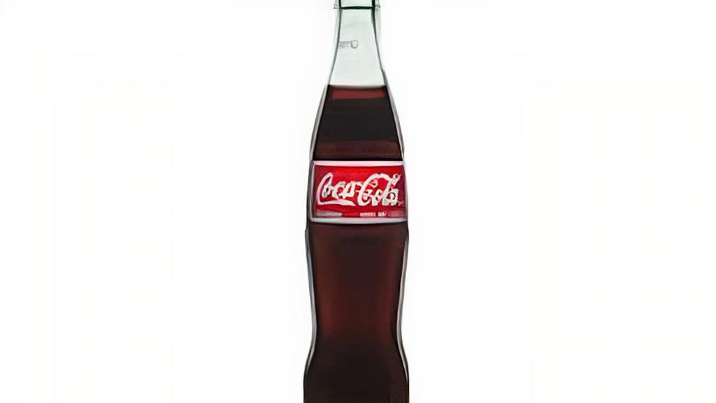 Mexican Coke · Mexican Coke-Made with pure cane sugar, no high fructose corn syrup, in a glass bottle.  355 ml