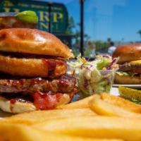Bbq Burger · 1/3-Pound Angus Beef Patty with
Crispy Bacon, Onion Rings & BBQ Sauce