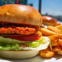 Buffalo Chicken Burger · Fried Chicken Breast tossed with Buffalo
Sauce with Lettuce & Tomato