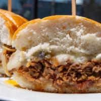 Philly Cheesesteak · Ribeye Steak with grilled Onions & Provolone
Cheese on a French Roll