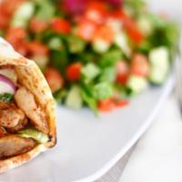 Chicken Shawarma Wrap · Served with salad and garlic sauce.