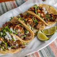 Tacos · Soft corn tortilla choice of meat, onions, cilantro, salsa. Add cheese and sour cream for ex...