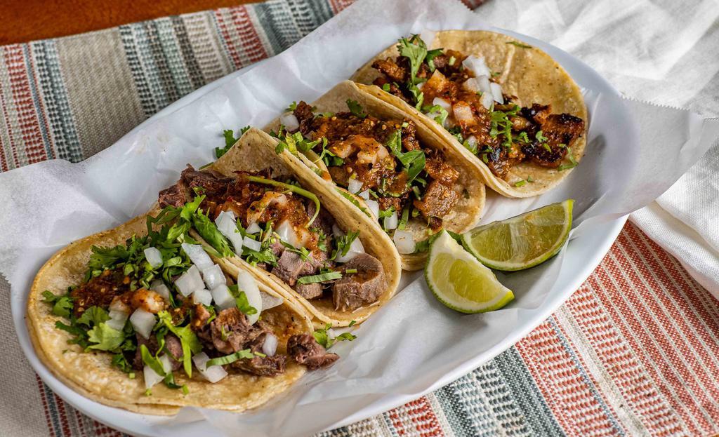 Tacos · Soft corn tortilla choice of meat, onions, cilantro, salsa. Add cheese and sour cream for extra charge.