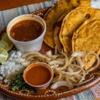 Tacos De Barbacoa · Three crispy tacos with barbacoa, served with grilled onions, onions, cilantro, special sals...