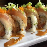 Crazy Albacore Roll · Shrimp tempura and spicy tuna inside topped with albacore and avocado served with B.A.D sauce.