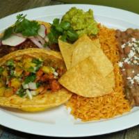 Benny’S 2 Taco Plate · Served with a side of chips, guacamole, rice & choice of pinto or black beans. And choice of...