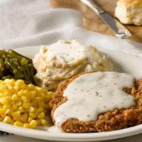 Country Fried Steak · A generous serving of USDA Choice steak breaded and fried, then topped with our Sawmill Grav...