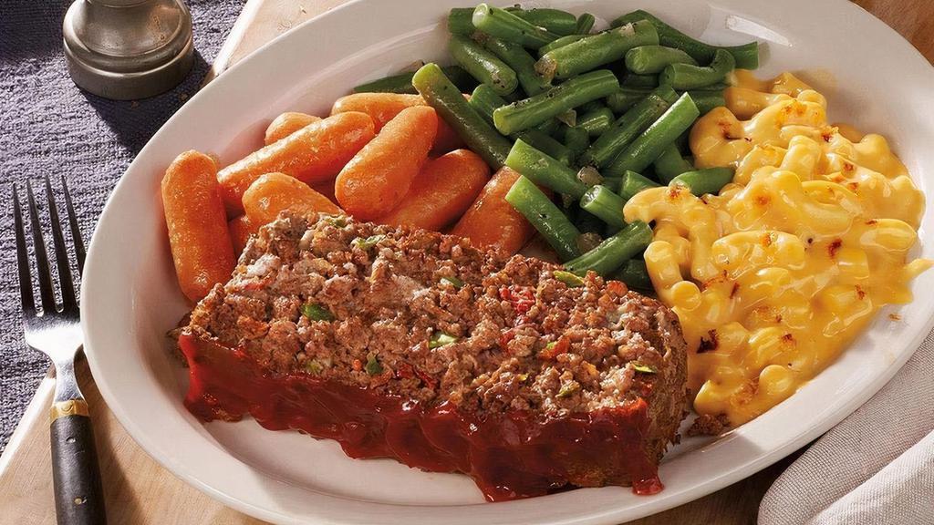 Meatloaf · Our special recipe with diced tomatoes, onions, and green peppers. .