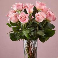 12 Long Stem Pink Roses · Enjoy the classic Beauty of the rose with a playful twist in our Long Stem Pink Rose Bouquet...