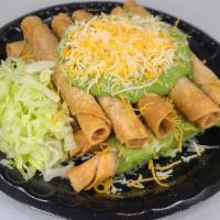 12 Rolled Tacos · with guacamole and cheese