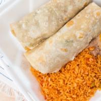 Beef Burrito · shredded beef, mixed with bell peppers, onions, tomatoes.