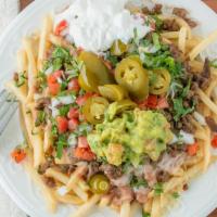 Carne Asada Fries · Comes with carne asada, guacamole, sourcream, cheese, beans, onions, cilantro, tomatoes, jal...