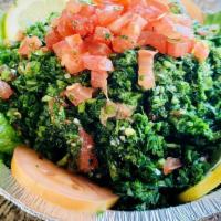 Tabouli Salad · Finely chopped parsley, with tomatoes, mint, green onions and bulgur. Seasoned with olive oi...