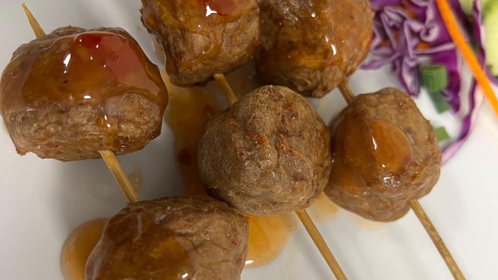Meatball Skewers  · Fried beef meat ball skewers side of sweet sour sauce
