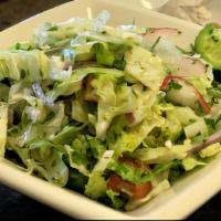 Cabbage Salad · Chopped fine with tomatoes and dried mint, choice of vinegar and olive oil or lemon and oliv...