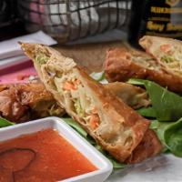 Egg Rolls · A classic. Fried crispy and served with sweet chili dip