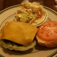 Nickel Burger · Cheddar cheese, lettuce, tomato, red onion, thousand island dressing.