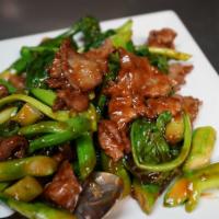 Beef With Chinese Broccoli · Quart size. Sliced beef and fresh chinese broccoli, dark sauce. Served with white rice.