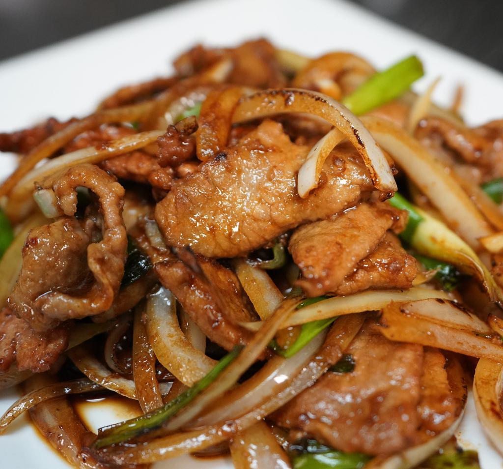Mongolian Beef · Beef toss-fried with onion. Served with white rice.