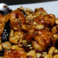 Kung Pao Shrimp · Shrimp, peanuts, scallions, and dried red peppers. Served with white rice. Spicy.