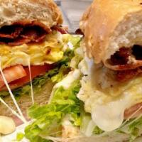 Breakfast Sandwich · Fried egg, bacon, lettuce, tomato, avocado, pickles onion, mayo remoulade