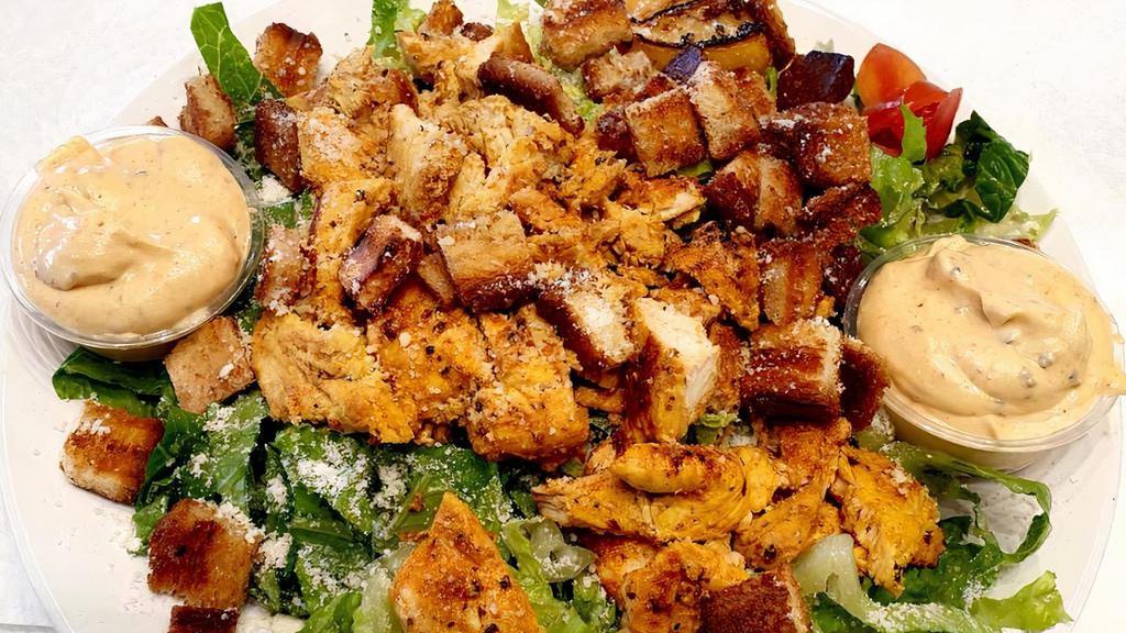 Grilled Chicken Caesar Salad · romaine lettuce, parmesan cheese, croutons, Caesar dressing
