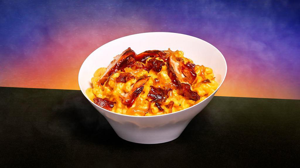 Bbq Mac And Cheese · Classic mac and cheese with sliced grilled chicken, BBQ sauce, bacon bits, and scallions.