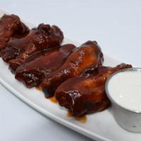 Jumbo Korean Bbq Wings · Jumbo wings marinated overnight, slow cooked, then deep fried golden brown and tossed in Kor...