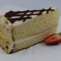Tres Leches Cake · Tender genoise cake soaked in the traditional three milks, layered with rich creamy mousse c...