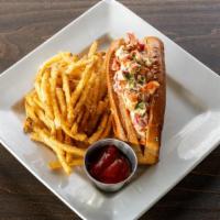 Butter Poached Lobster Roll · Herb Poached Lobster, New England Style Bun, Lime and Celery Aioli