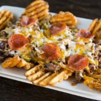 K Bbq Pizza Fries · Waffle fries covered with marinated sweet & spicy bulgogi beef & onions, topped with peppero...
