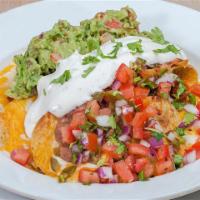 Nachos · Choice of chicken, asada, meat sauce. Melted cheese, pico de gallo, re-fried beans, sour cre...