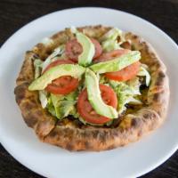 Patty Cake/ Burger Pizza · Home-made burger patty, grilled onions, bacon, 1000 island, mixed salad, tomato, avocado, ch...