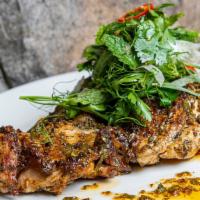Natural 'Brick' Half Chicken With Regular Side (2) · Wood grilled, red chimichurri sauce, green peppercorn au poivre sauce, fresh herb salad