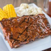Louis Bbq. Ribs (Half Rack) · Half rack of slow roasted St. Louis cut pork ribs, glazed in signature bbq sauce