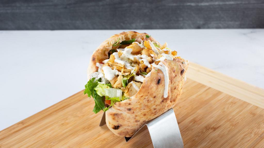 Chicken Breast Shawarma · All natural delicate and juicy chicken breast seasoned with authentic shawarma spices and slowly cooked on vertical grill