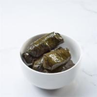 Dolma ( Grape Leaves ) · Grape leaves stuffed with Rice, Vegetables and Spices with lemon juice and olive oil ( 5 per...