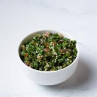 Tabouli Salad · chopped parsley with tomatoes ,onion ,bulgur ,olive oil, lemon juice