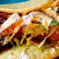 Falafel Gyro · Toppings include lettuce, tomato, onions, red cabbage, tzatziki sauce, and your choice of hu...