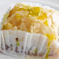 Baklava · Sweet pastry made of layers of filo dough filled with chopped nuts and honey.