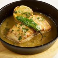 Sea Bass · Grilled sea bass, wine chimichurri with mussel broth. Includes one side.