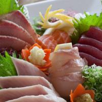 Sashimi Sampler · 17 pcs Sashimi: Tuna, Albacore, Yellowtail, Salmon, 
Red Snapper