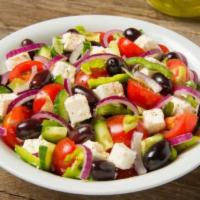 Greek Salad · Mixed greens with cucumber, tomato, black olives, and feta cheese.