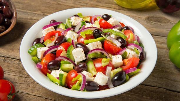 Greek Salad · Mixed greens with tomato, black olives, and feta cheese.