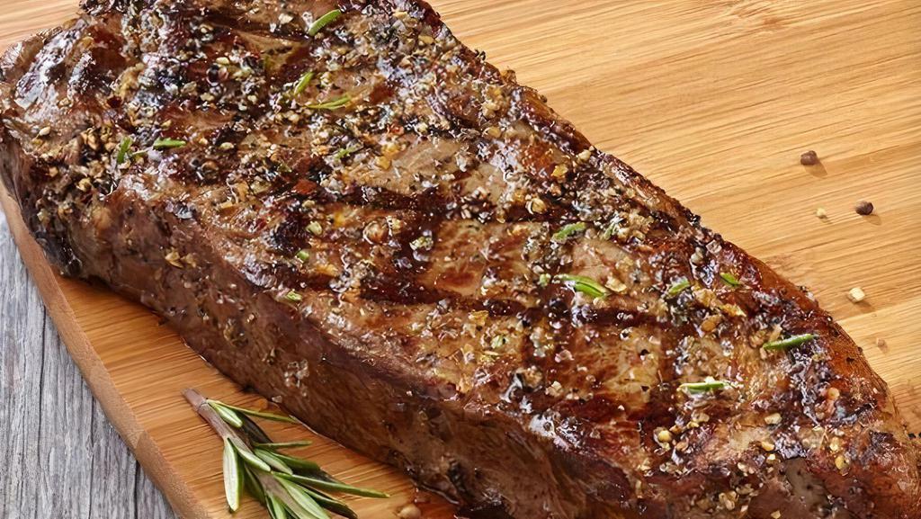 12 Oz. Angus New York Steak · Tender USDA choice Angus strip loin. Served with choice of any 1 side. 812 cal.