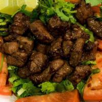 Shaking Beef - Filet Mignon (Bò Lúc Lắc) · Pan fried diced beef(Filet Mignon) with lettuce, onion, tomato, & jalapeño.