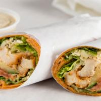 Wrap Chicken Caesar · Grilled chicken breast, romaine lettuce, tomatoes, cucumbers topped with caesar dressings an...