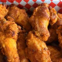 Breaded Chicken Wings · Wings made fresh daily in store. Marinated for 24 hours then tossed in seasoned flour and co...