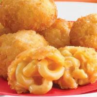 Macaroni And Cheese Bites · 10 pieces of cheesy macaroni and cheese rolled into bite sized pieces then coated with seaso...