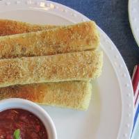 Bread Sticks · 8 Breadsticks topped with parmesan cheese and a blend of spices. Served with a side of marin...